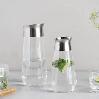 KINTO LUCE Water Carafe set with clear heat-resistant glass and stainless steel lids on a light surface