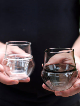 KRUVE PROPEL Espresso Glasses (75ml) 2-Pack with hand-blown borosilicate glass and curved design held in hands